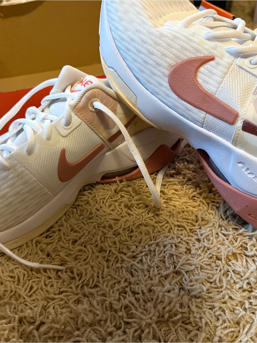 Nike White Athletic Sneakers with Rose Pink Swoosh
